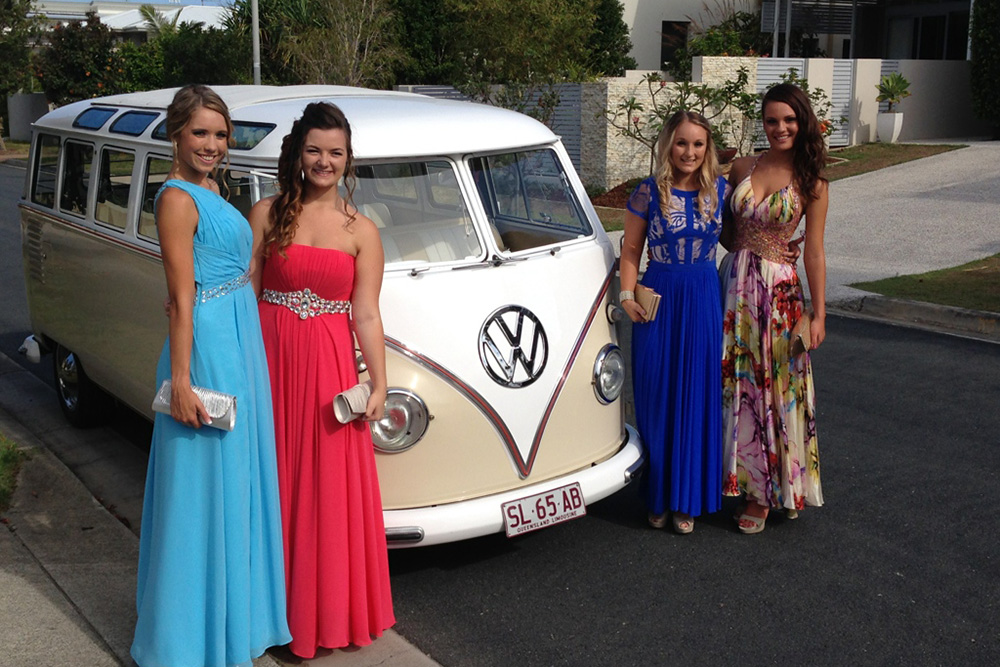 School formal girls dressed up waiting to leave 